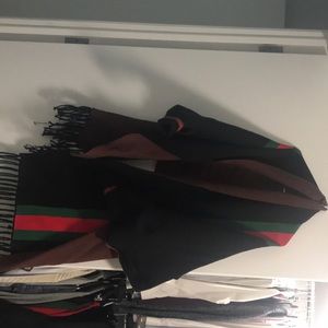 Striped shawl with 3/4 length sleeves.